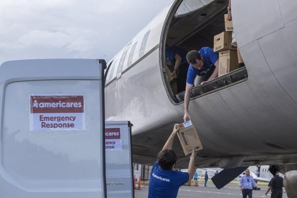 Baxter-donated products arriving in Puerto Rico with Americares Emergency Response Flight. Photo Credit: Alejandro Granadillo/Americares.